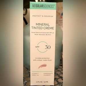 New in package tinted mineral cream spf 30
